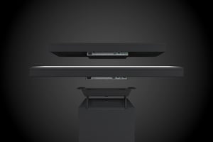 The illustration shows a 43 inch and a 55 inch Hatteland Technology monitor hovering above the chart table base, showing how the T40 is modular, with monitors interchangeable. 