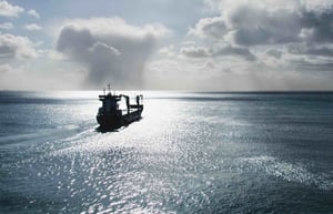 ship-heading-out-to-sea-in-strong-sunlight-optical-bonding-2026